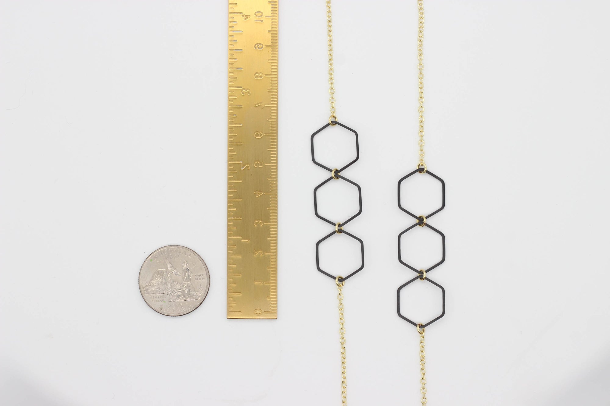 "Le Contour" Honeycomb Hexagon Black and Gold Long Necklace